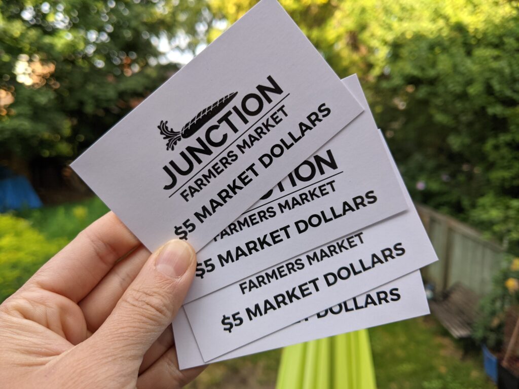 A series of tickets with the Junction logo.
